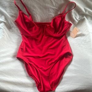 Deep v shape wear/ one piece swim suit. New with tags.